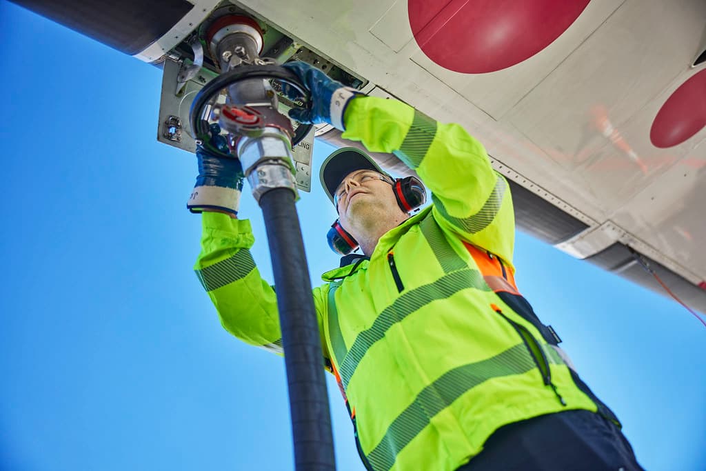fueling airplane wing